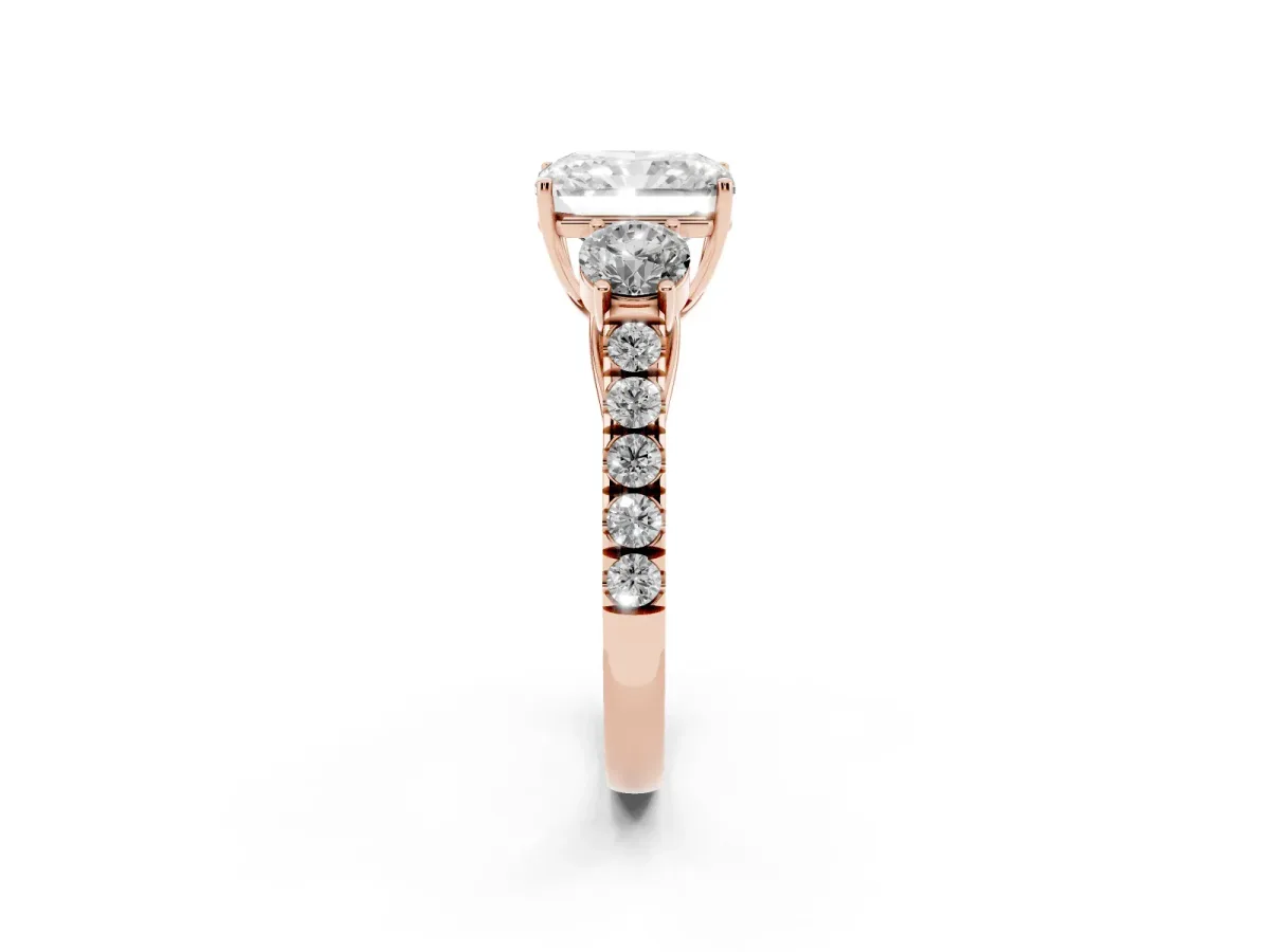 Radiant Cut Cut Diamond Three-Stone Ring with Round Side Stones and Pavé Band Rose gold