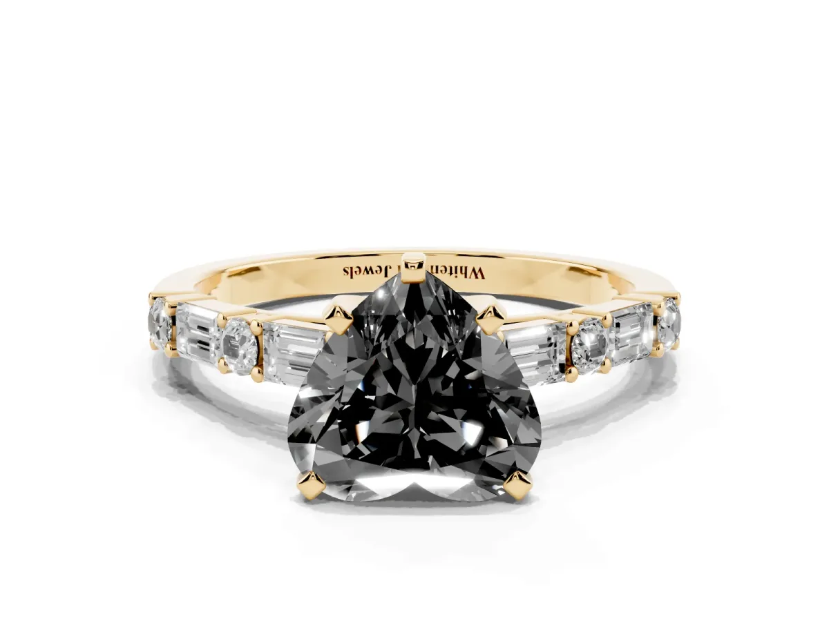 Fancy Black Heart Cut Diamond Solitaire with Side Baguettes and Channel Set Band Yellow gold