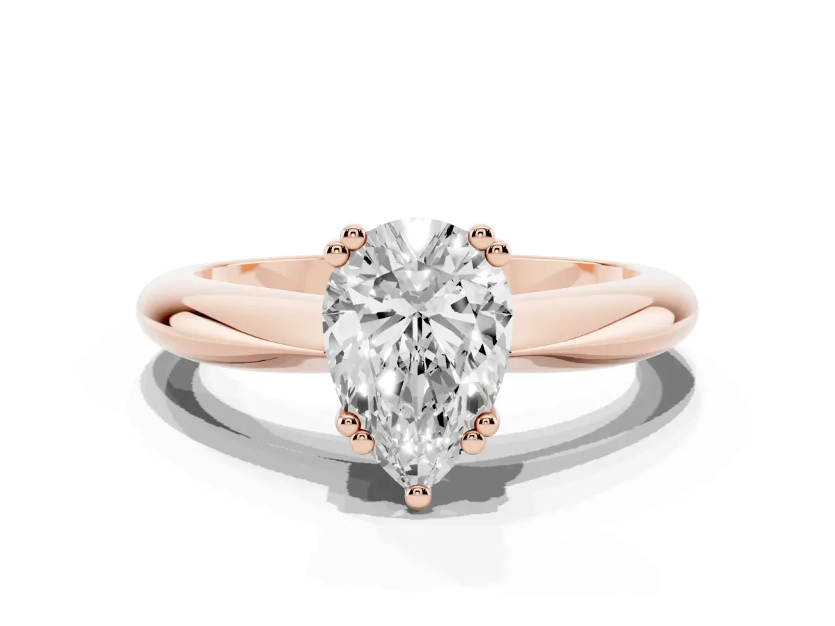 Pear Cut Cut Solitaire Engagement Ring with Tapered Band and Four-Prong Setting Rose gold