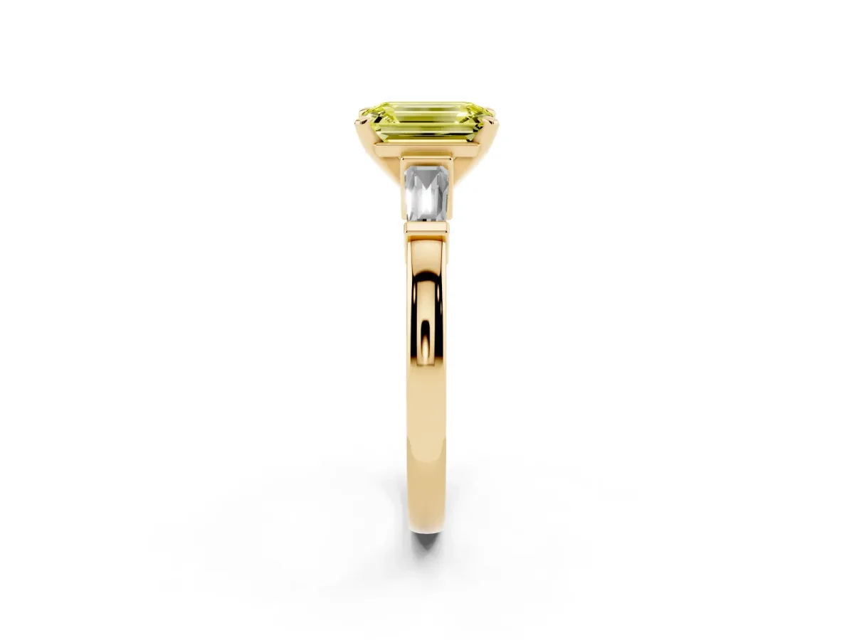 Fancy Yellow Emerald Cut Cut Diamond Solitaire Ring with Tapered Baguette Accents and Four-Prong Setting Yellow gold