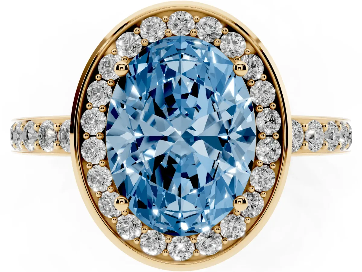 Fancy Blue Oval Cut Diamond Halo Ring with Bezel Frame and Pavé Band Yellow gold