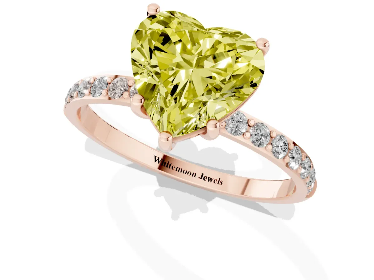 Fancy Yellow Heart Cut Diamond Solitaire Ring with Round Pavé Shoulders and Prong Setting Rose gold