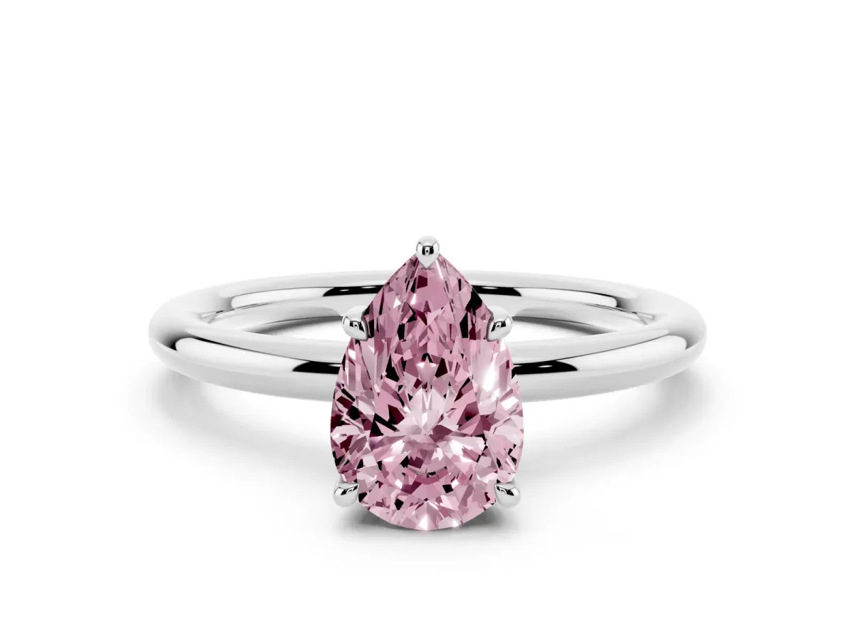 Fancy Pink Pear Cut Diamond Solitaire Ring with Thin Band and Four-Prong Setting Silver