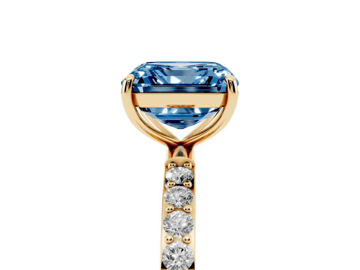 Fancy Blue Asscher Cut Diamond Solitaire Ring with Round Pavé Shoulders and Prong Setting Yellow gold