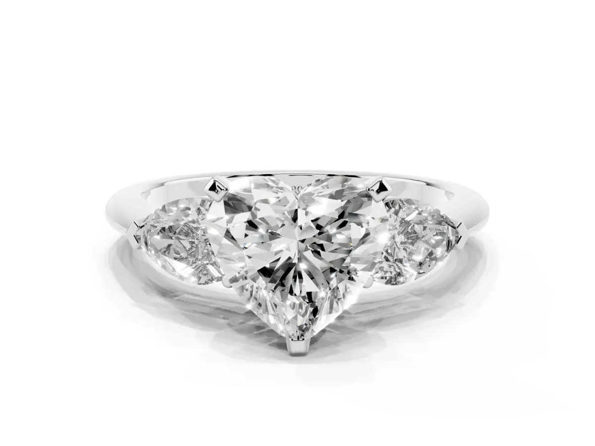 Three-Stone Heart Cut Diamond Ring with Pear Side Stones and Four-Prong Setting Platinum