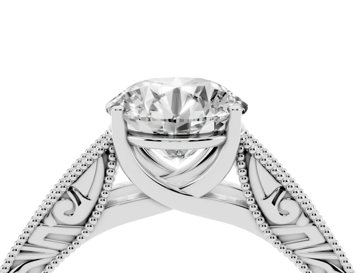 Round Cut Diamond Solitaire Ring with Engraved Band and Four-Prong Setting White gold