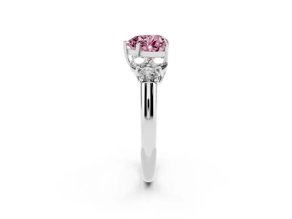 Fancy Pink Heart Cut Cut Diamond Cluster Ring with Round Accent Stones and Prong Setting on a Classic Band White gold