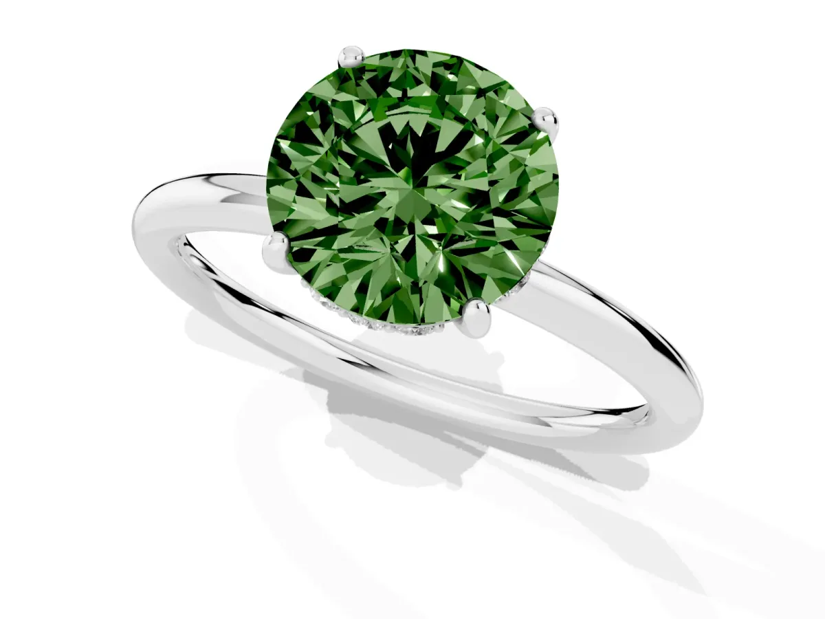 Fancy Green Round Cut Solitaire Diamond Ring with a Classic Band and Four-Prong Setting Silver
