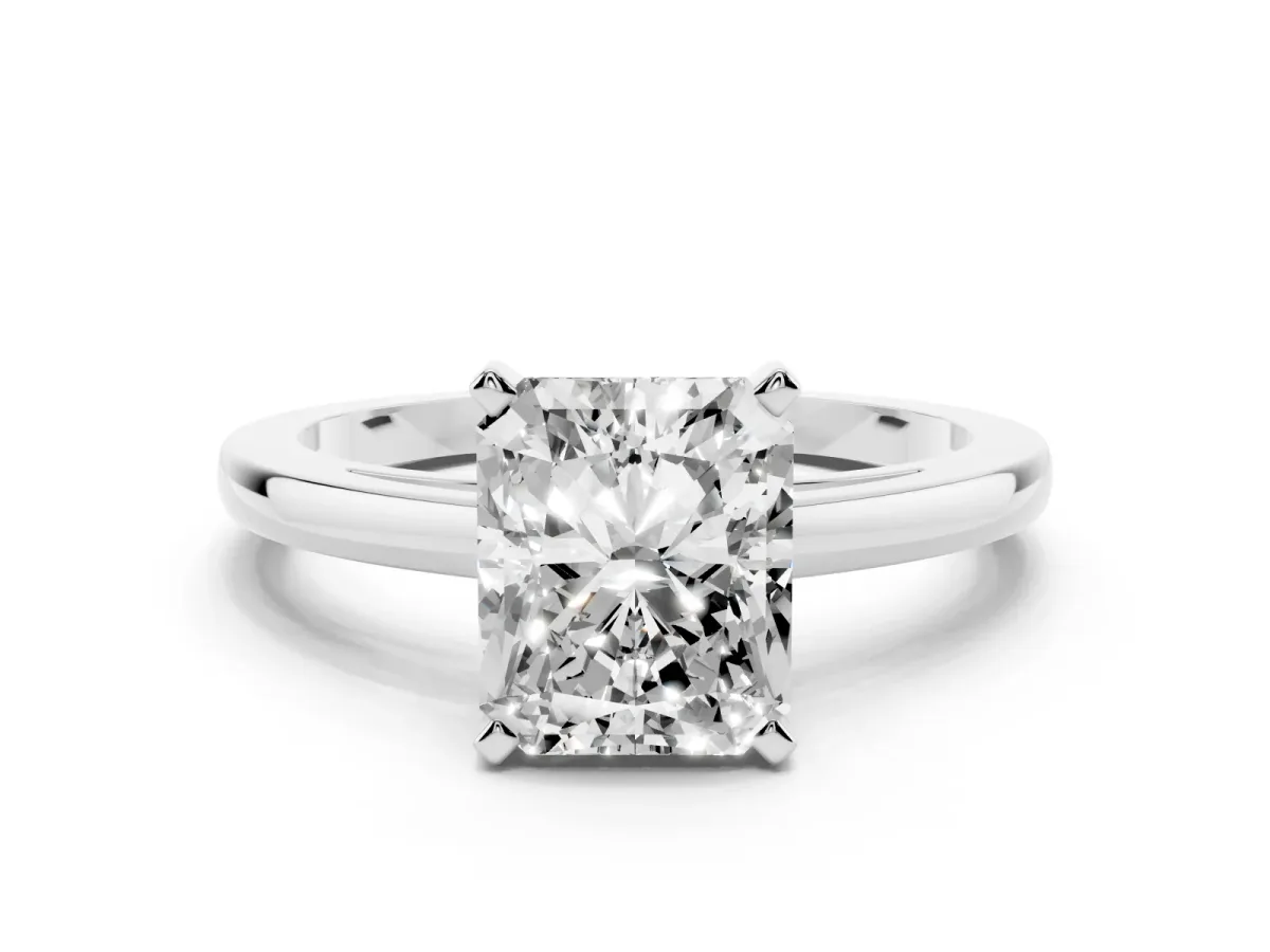 Radiant Cut Solitaire Diamond Engagement Ring with Four-Prong Setting on a Classic Band Silver