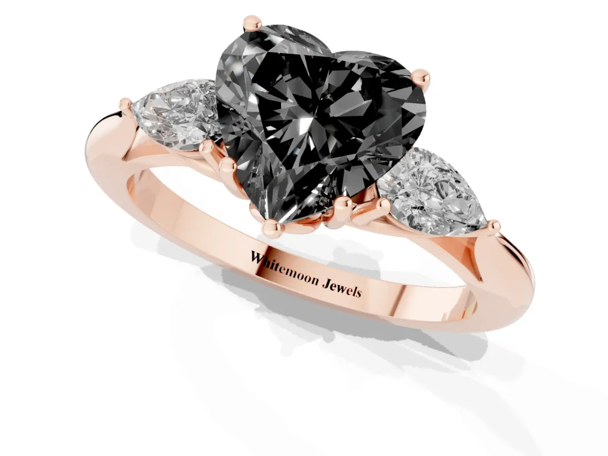 Fancy Black Three-Stone Heart Cut Brilliant Diamond Solitaire Ring with Tapered Band and Four-Prong Setting Rose gold