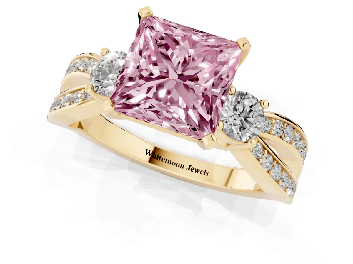 Fancy Pink Three-Stone Princess Cut Cut Diamond Twist Band with Prong Setting Yellow gold