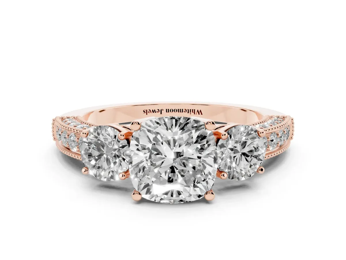 Cushion Cut Three-Stone Diamond Ring with Pavé Band and Four-Prong Setting Rose gold