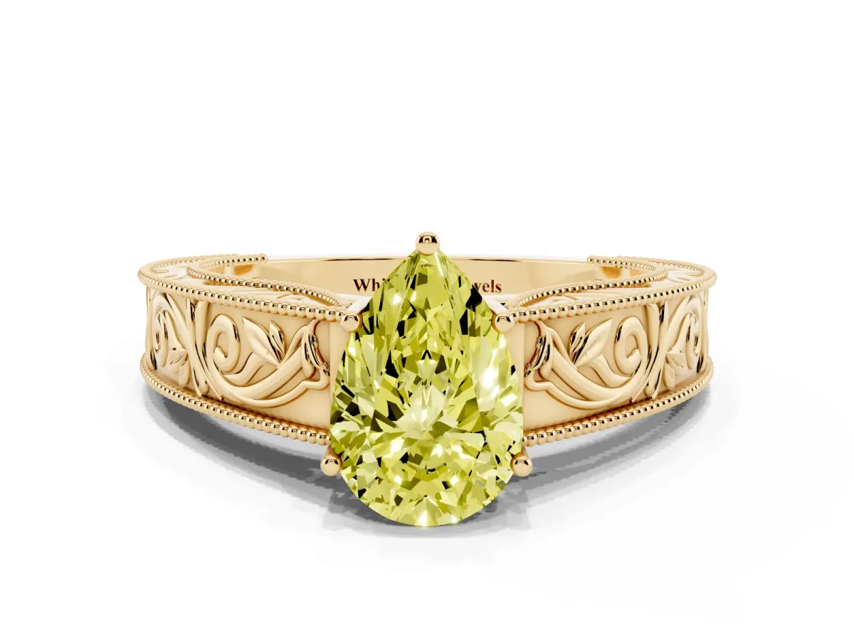 Fancy Yellow Pear Cut Diamond Solitaire Ring with Engraved Band and Four-Prong Setting Yellow gold