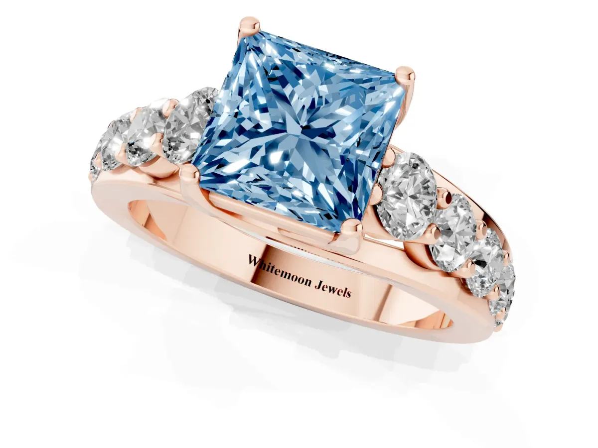 Fancy Blue Princess Cut Diamond Engagement Ring with Pavé Band and Four-Prong Setting Rose gold