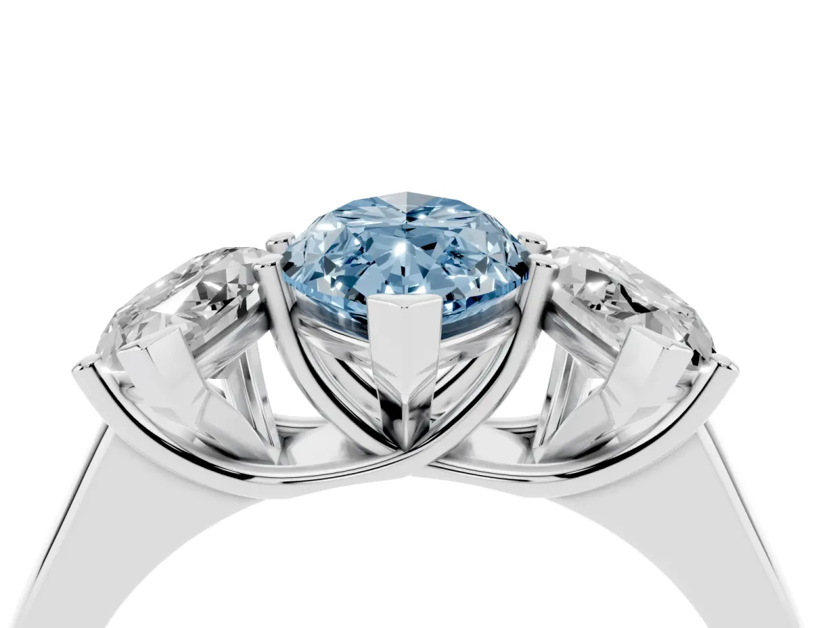 Fancy Blue Marquise Cut Three-Stone Diamond Ring with Prong Setting on a Classic Band Silver