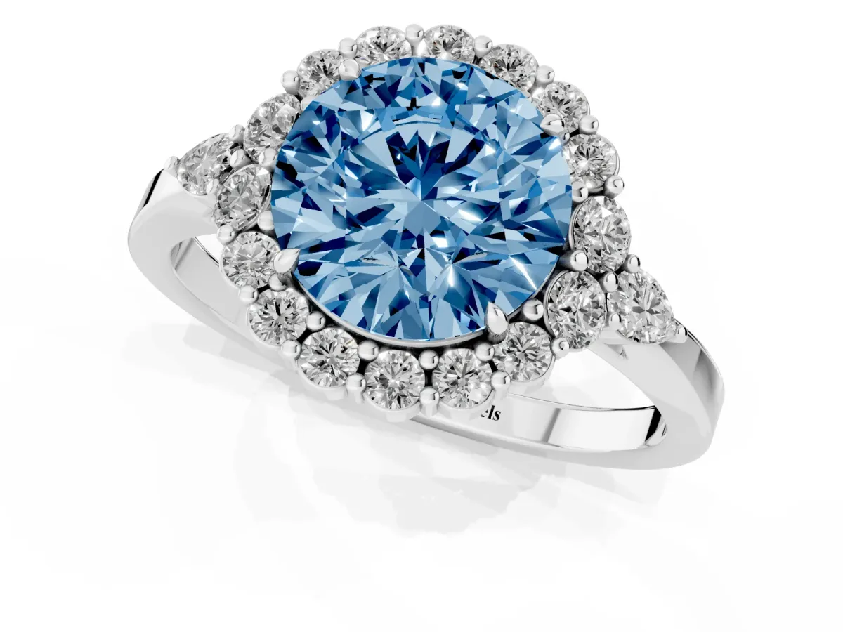 Fancy Blue Round Cut Diamond Halo Ring with Pear Side Stones and Prong Setting Silver