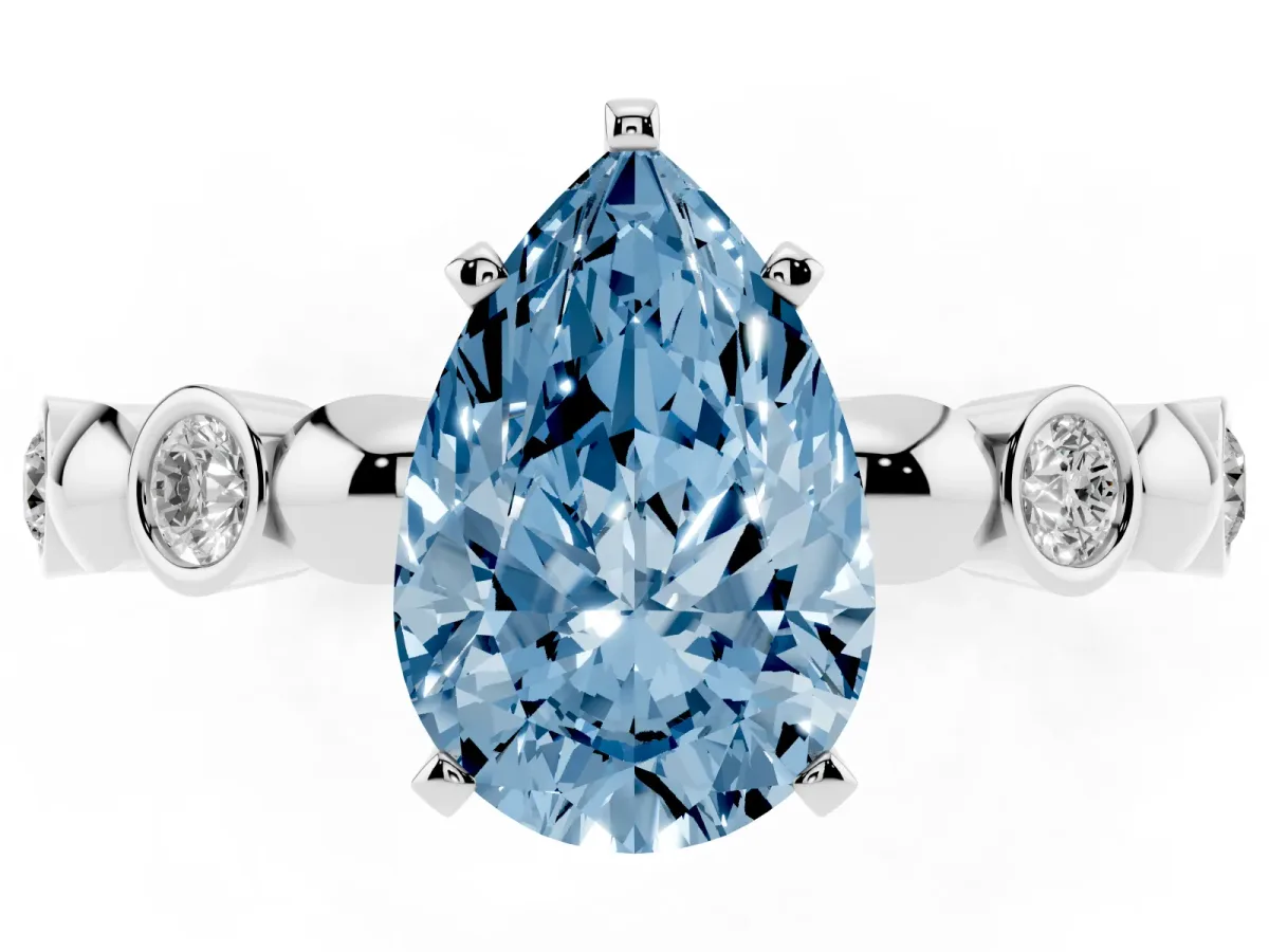 Fancy Blue Pear Cut Solitaire Bezel-Set Diamond Ring with Beaded Band and Four-Prong Setting Silver