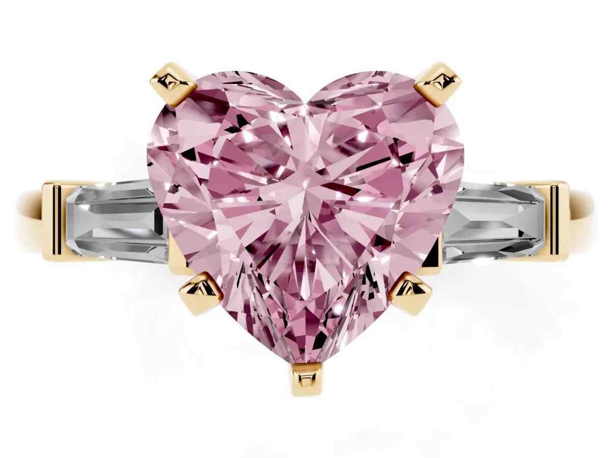 Fancy Pink Heart Cut Cut Diamond Solitaire Ring with Tapered Baguette Accents and Four-Prong Setting Yellow gold