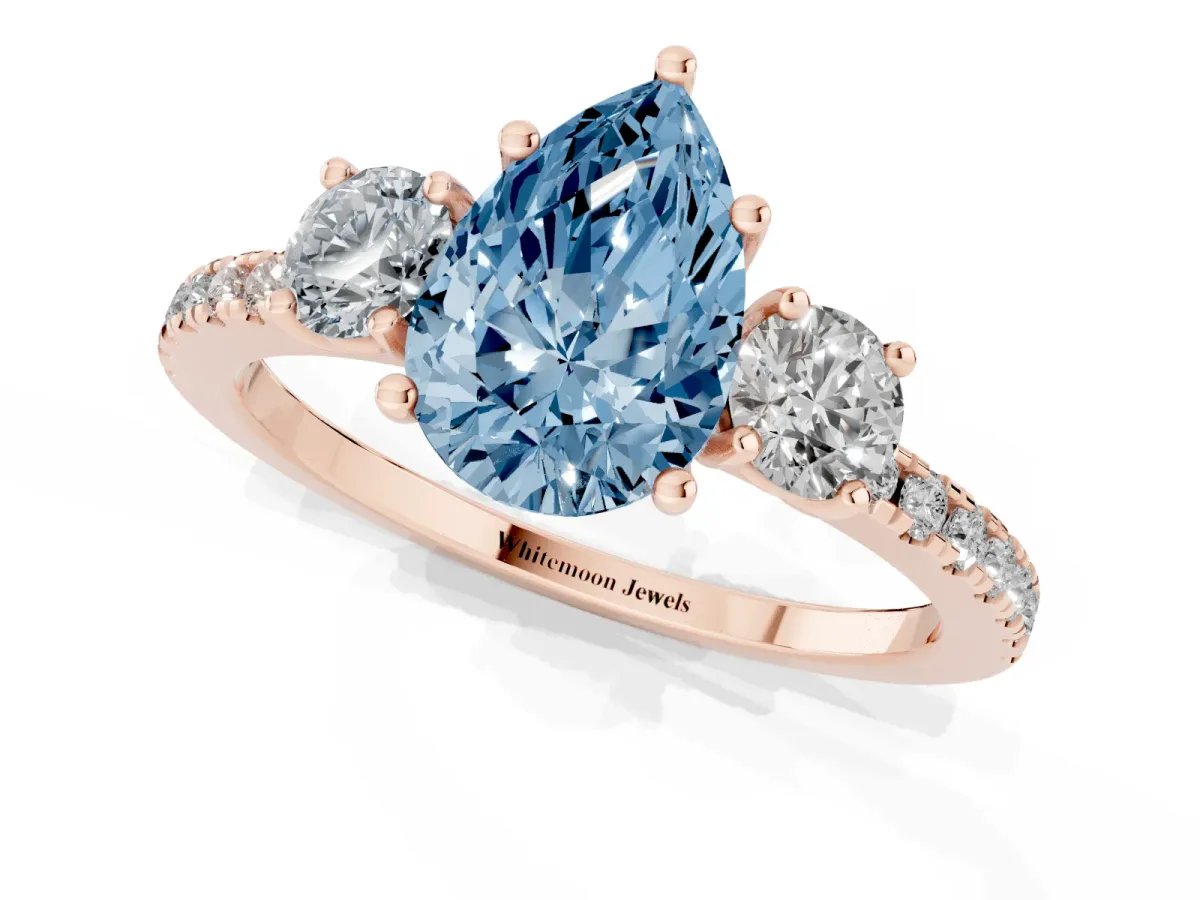 Fancy Blue Three-Stone Pear Cut Cut Diamond Pavé Band with Prong Setting Rose gold