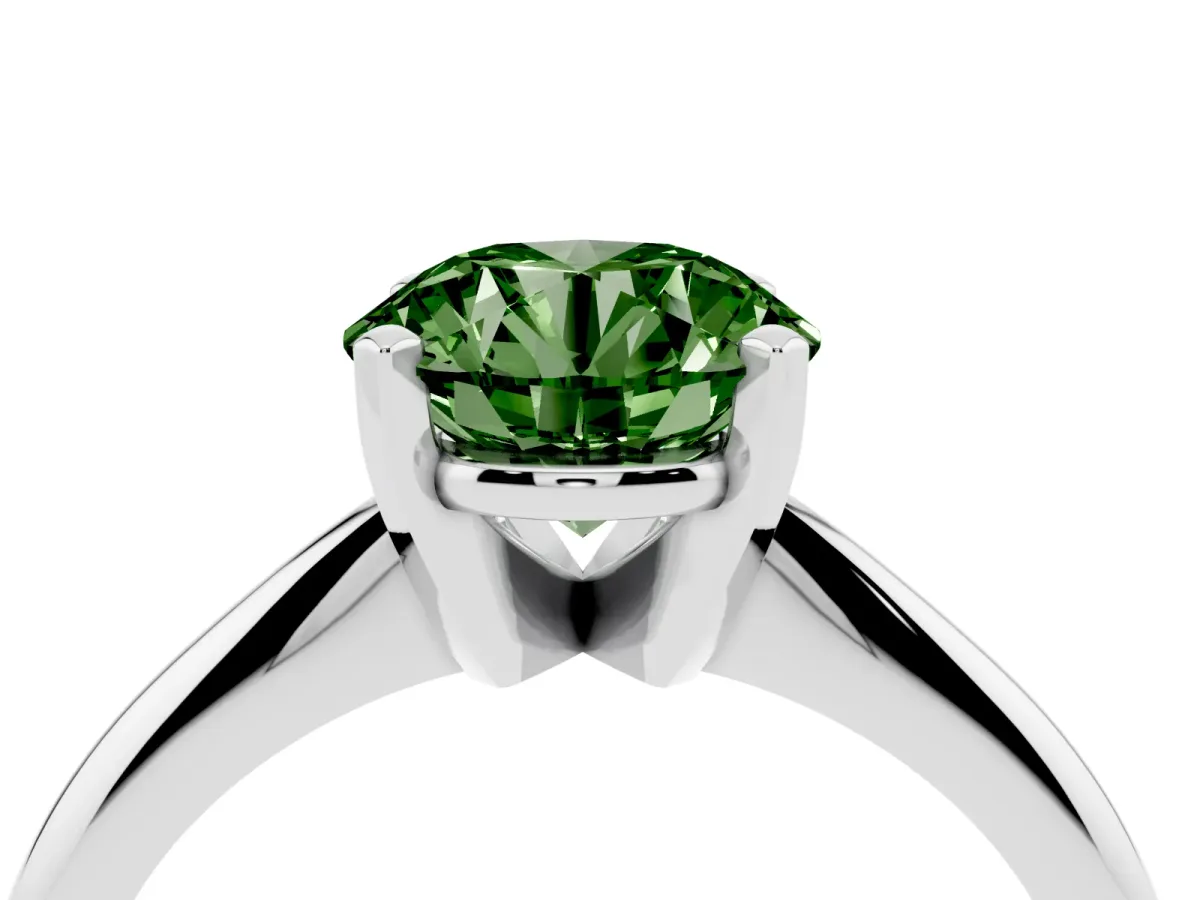 Fancy Green Round Cut Cut Solitaire Ring with Four-Prong Setting on a Classic Band Silver