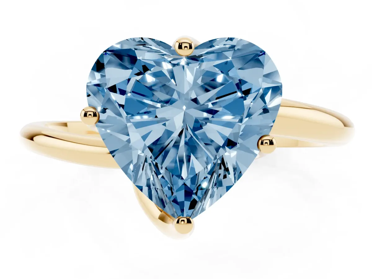 Fancy Blue Heart Cut Diamond Solitaire Engagement Ring with Four-Prong Setting and Classic Band Yellow gold