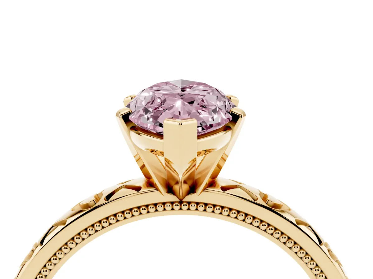 Fancy Pink Marquise Cut Solitaire Diamond Engagement Ring with XO Engraved Band and Four-Prong Setting Yellow gold