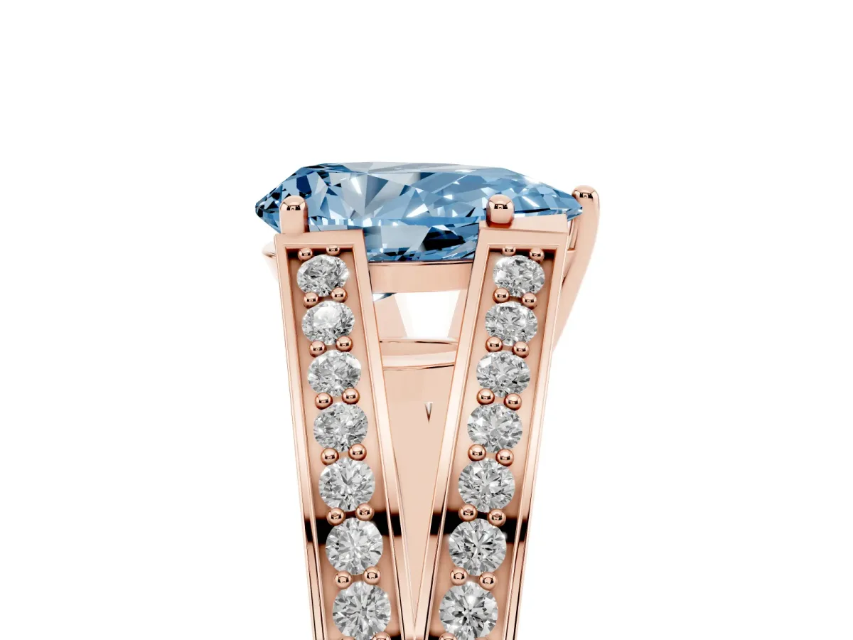 Fancy Blue Pear Cut Diamond Split Shank Ring with Pavé Band and Four-Prong Setting Rose gold