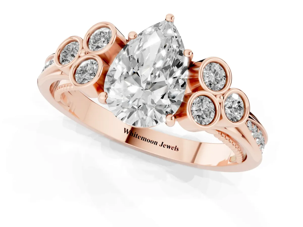 Pear Cut Cut Diamond Engagement Ring with Bezel Set Round Side Stones and Prong Setting Rose gold