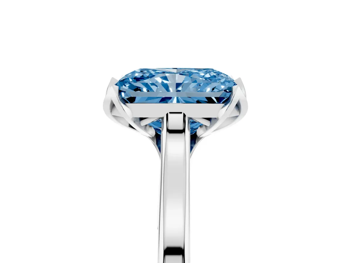 Fancy Blue Radiant Cut Diamond Solitaire Ring with Flower Prong Setting and Classic Band Silver