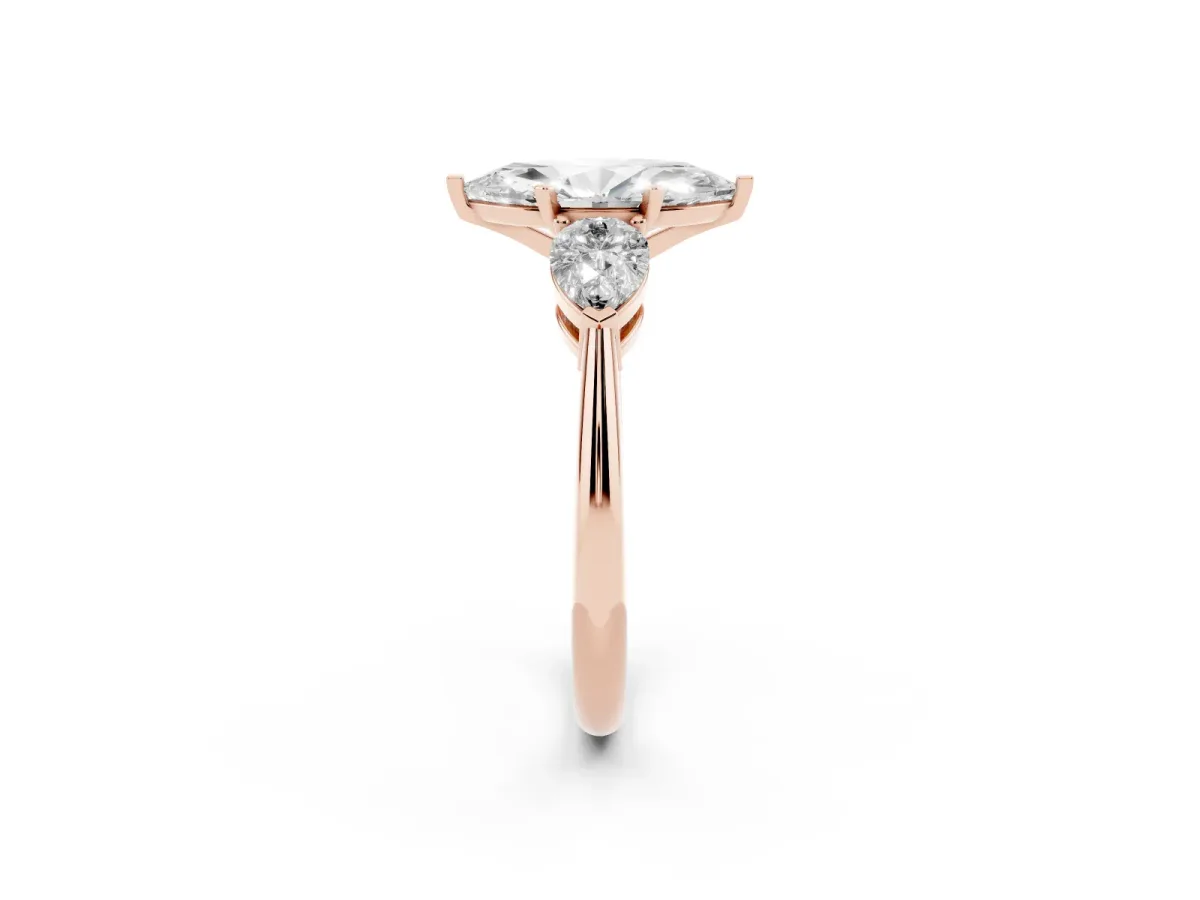 Three-Stone Marquise Cut Diamond Ring with Pear Side Stones and Four-Prong Setting Rose gold