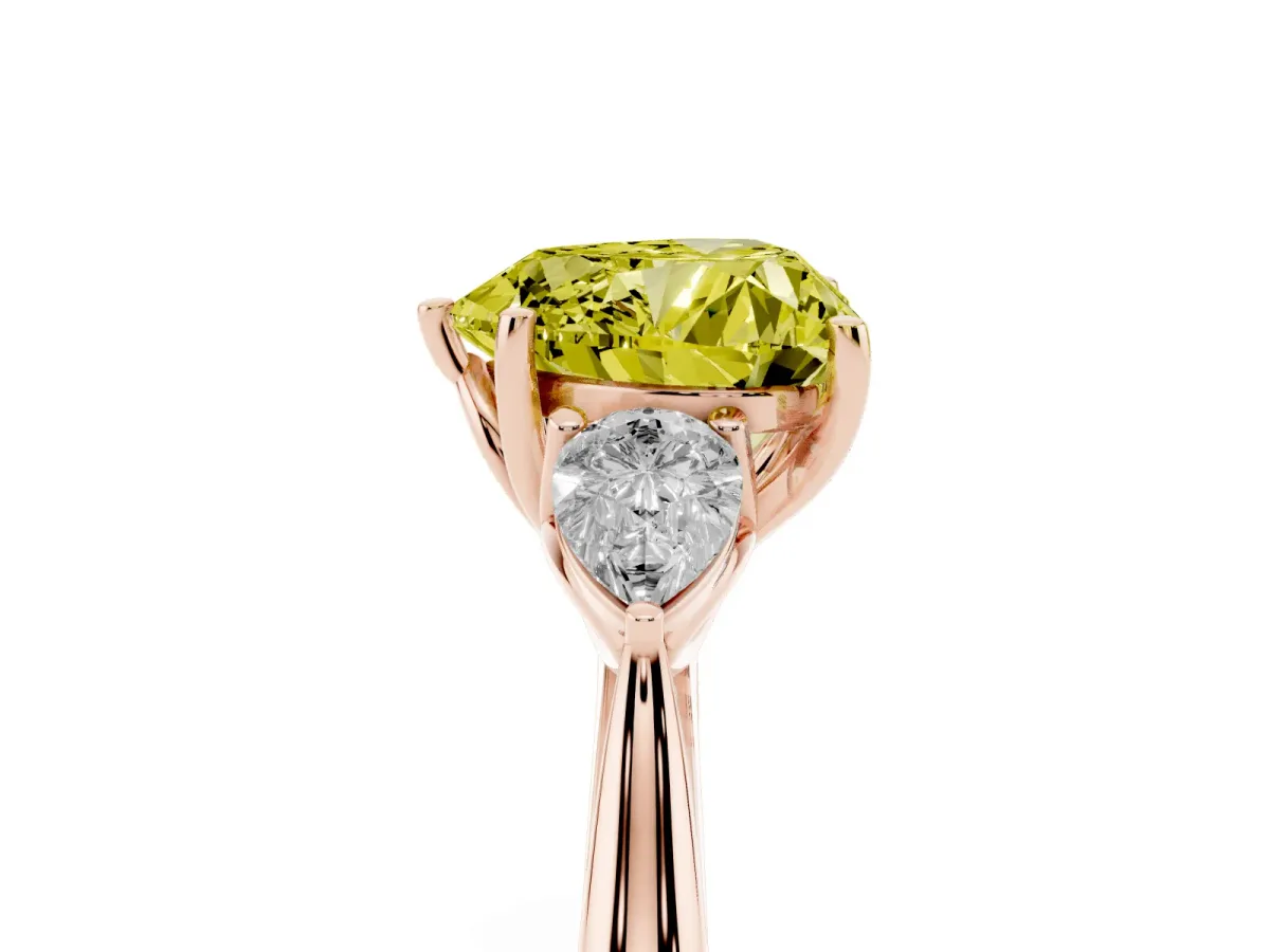 Fancy Yellow Three-Stone Heart Cut Brilliant Diamond Solitaire Ring with Tapered Band and Four-Prong Setting Rose gold