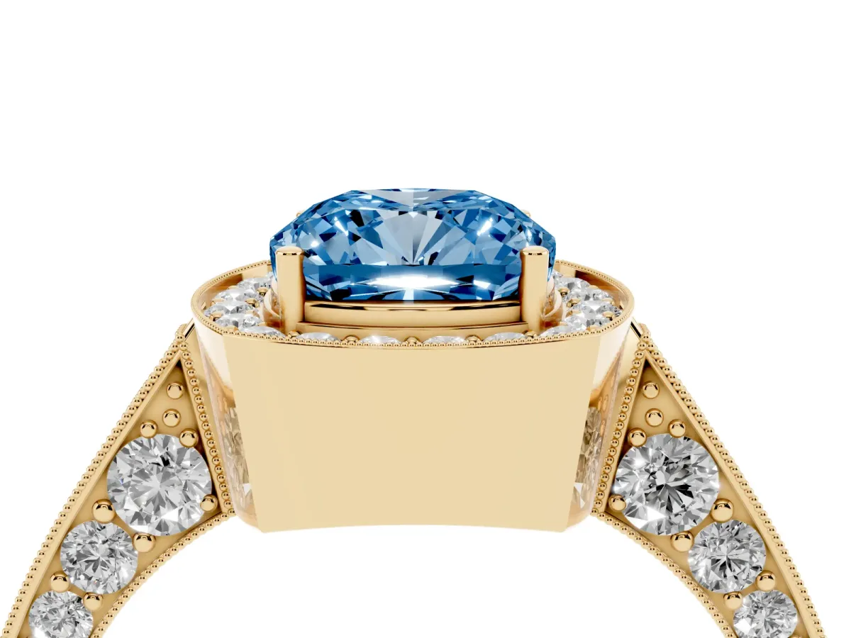 Fancy Blue Cushion Cut Halo Diamond Engagement Ring with Split Shank Band and Four-Prong Setting Yellow gold