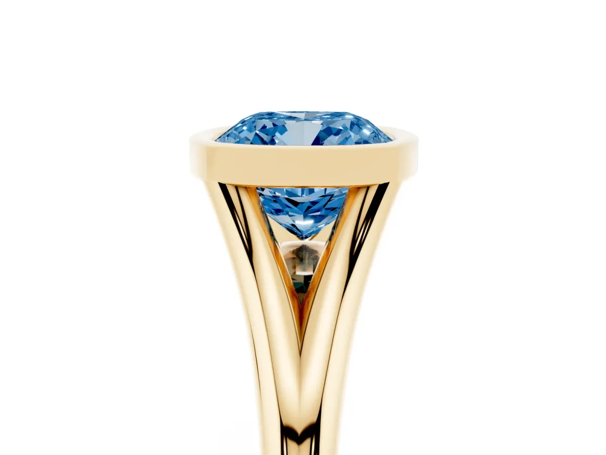 Fancy Blue Bezel Set Cushion Cut Cut Solitaire Ring with Tapered Band Yellow gold