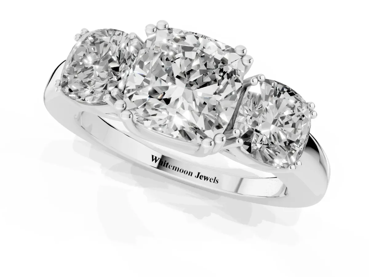 Three-Stone Cushion Cut Cut Diamond Ring with Channel Set Band and Four-Prong Setting Silver