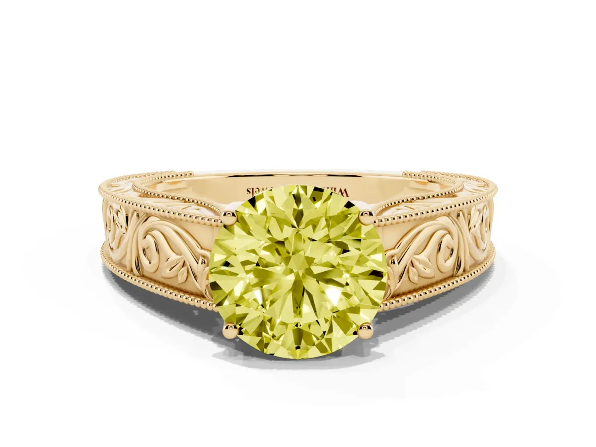 Fancy Yellow Round Cut Diamond Solitaire Ring with Engraved Band and Four-Prong Setting Yellow gold