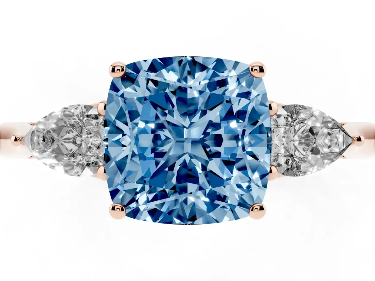 Fancy Blue Three-Stone Cushion Cut Diamond Ring with Pear Side Stones in Four-Prong Setting Rose gold