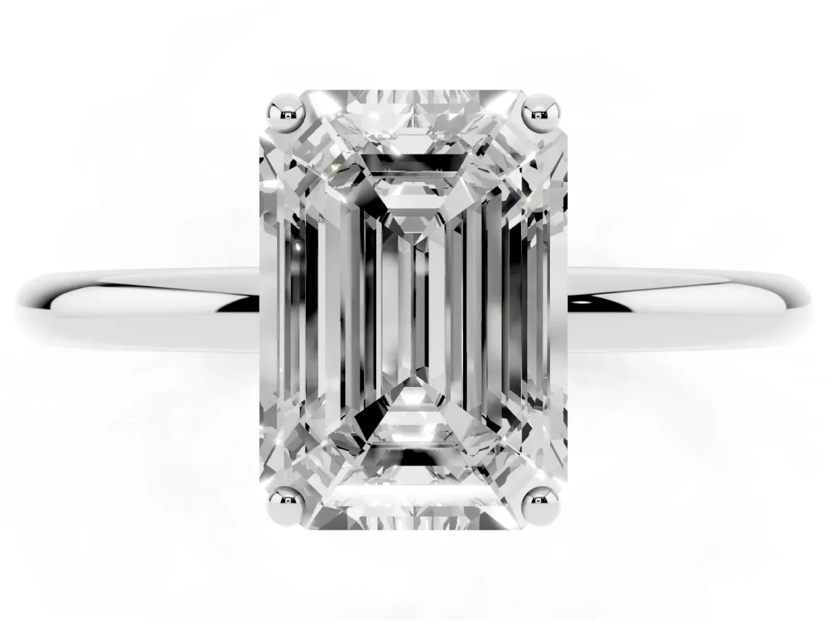 Emerald Cut Solitaire Diamond Ring with a Classic Band and Four-Prong Setting Silver