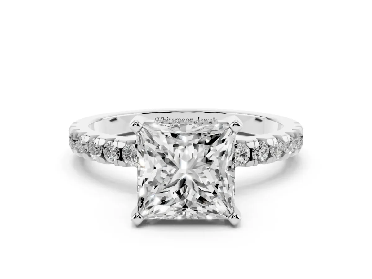 Princess Cut Diamond Solitaire Ring with Round Pavé Band and Four-Prong Setting Silver
