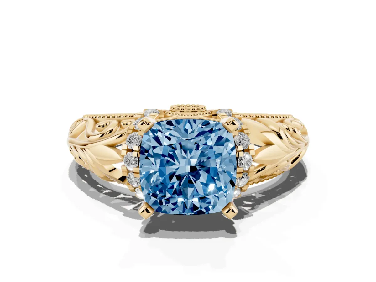 Fancy Blue Cushion Cut Solitaire Filigree Engagement Ring with Halo and Prong Setting Yellow gold