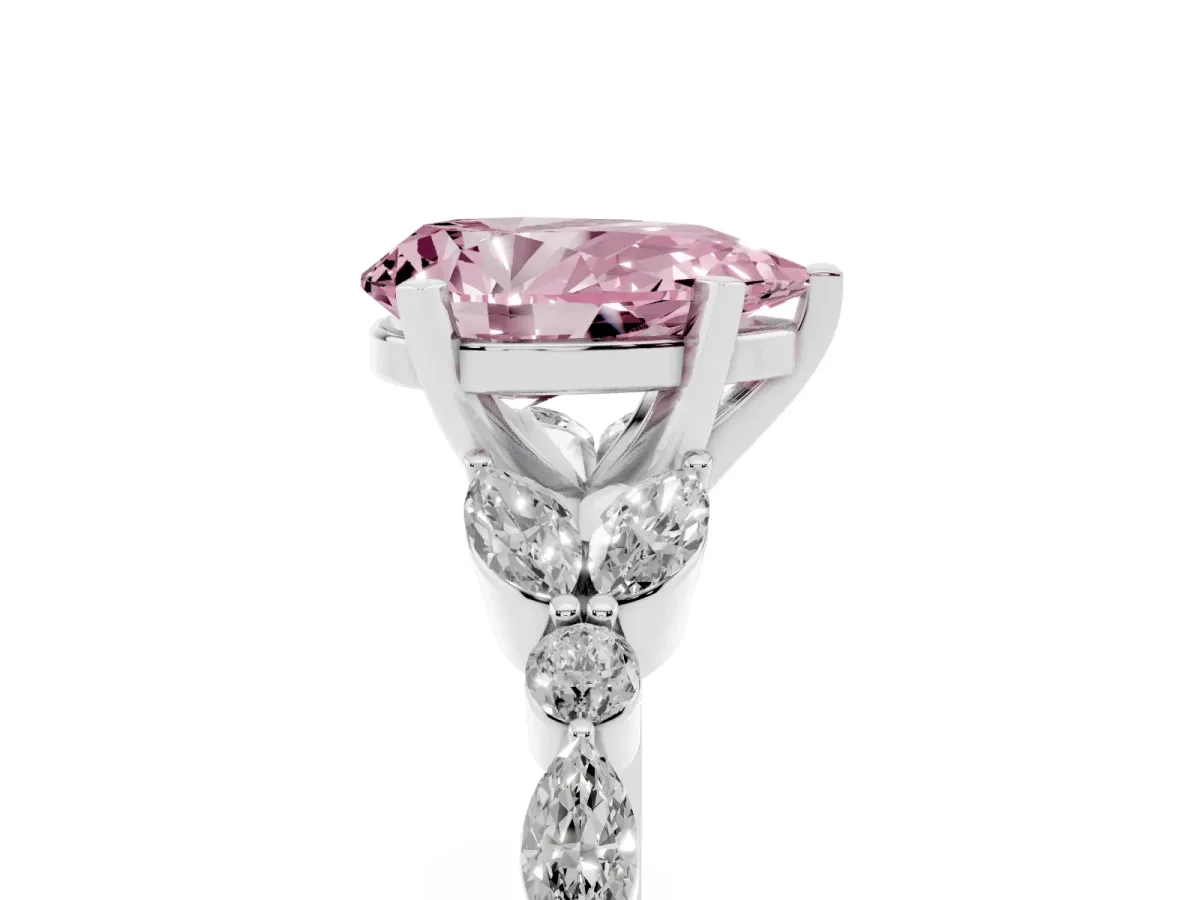 Fancy Pink Pear Cut Diamond Solitaire Ring with Side Stones and Four-Prong Setting Platinum