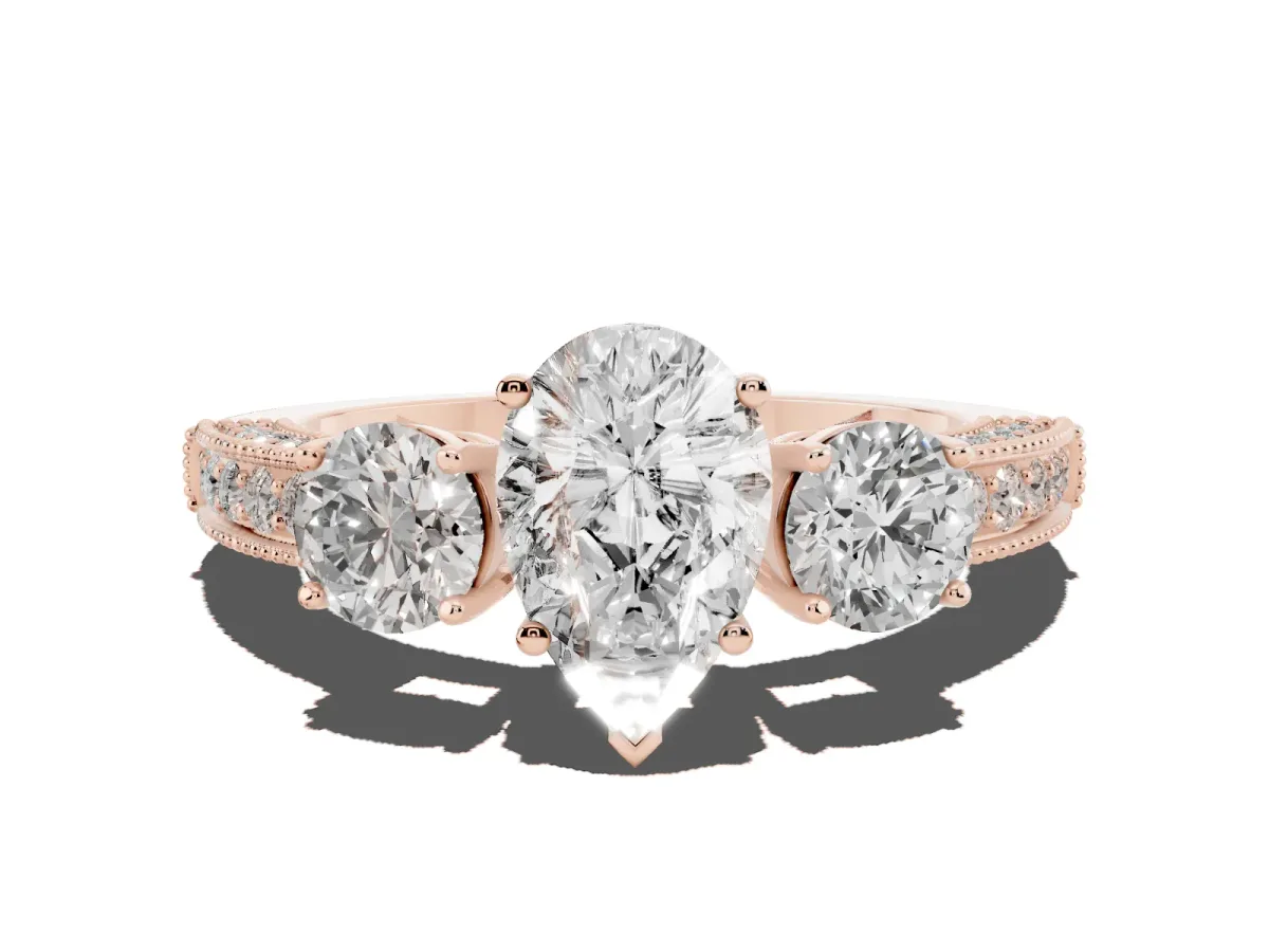 Pear Cut Three-Stone Diamond Ring with Pavé Band and Four-Prong Setting Rose gold