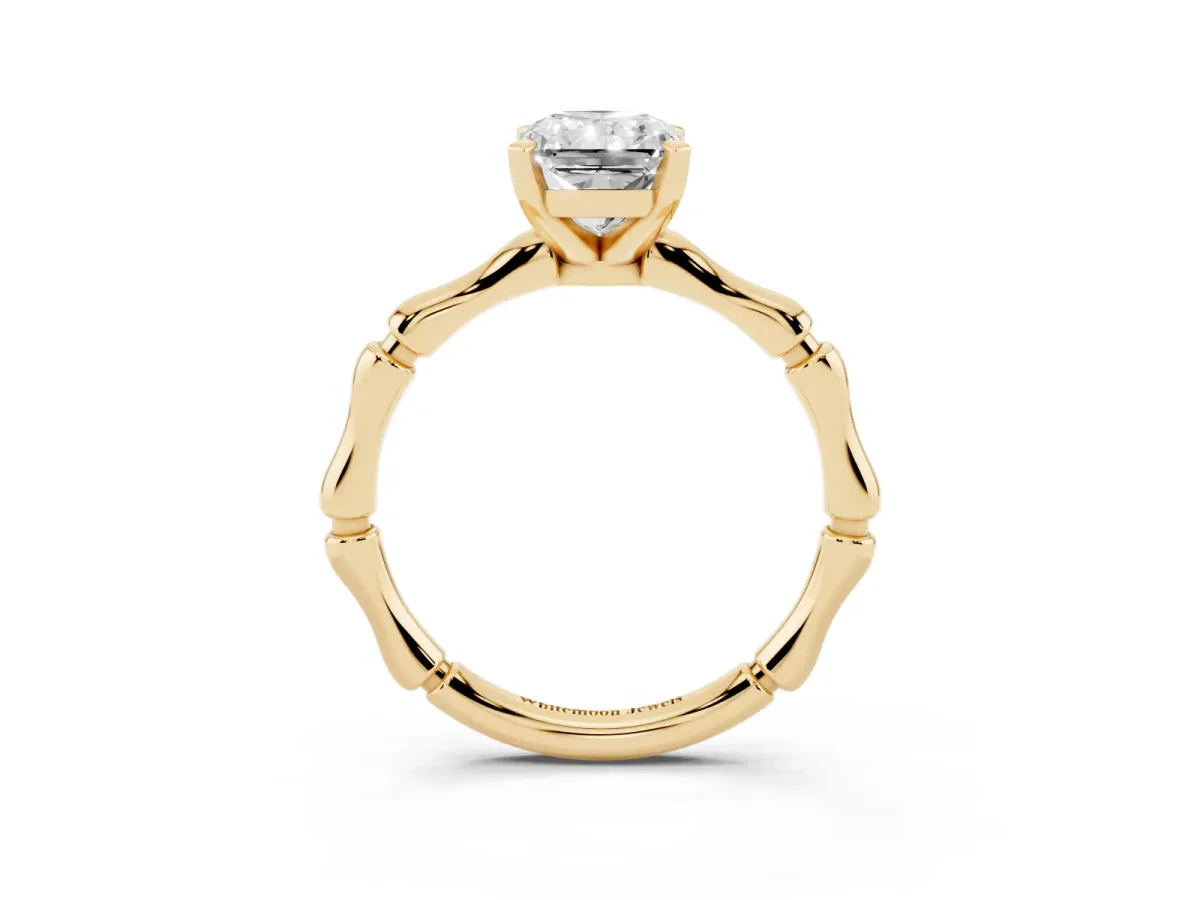 Radiant Cut Solitaire Diamond Ring with Bamboo Band and Four-Prong Setting Yellow gold
