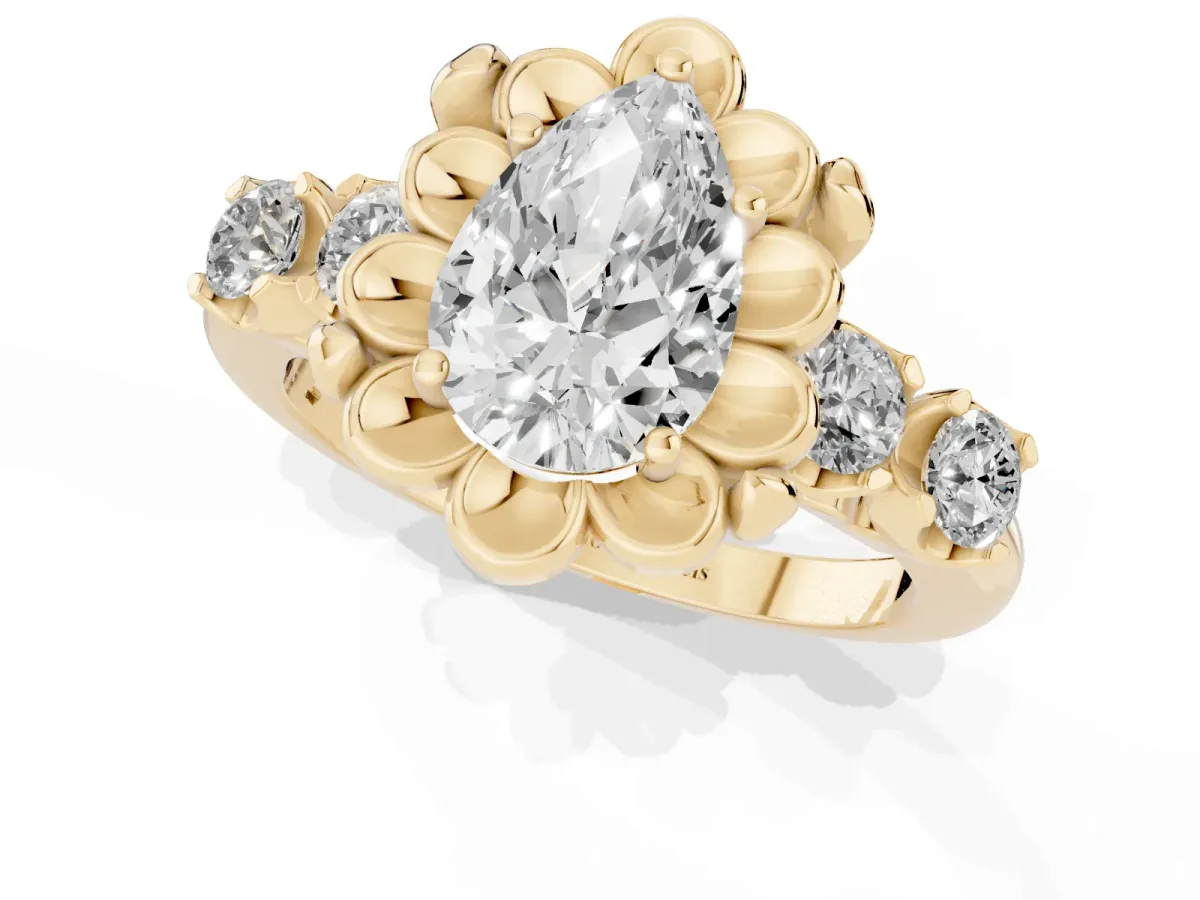 Pear Cut Cut Diamond Floral Halo Engagement Ring with Shared Prong Setting Yellow gold