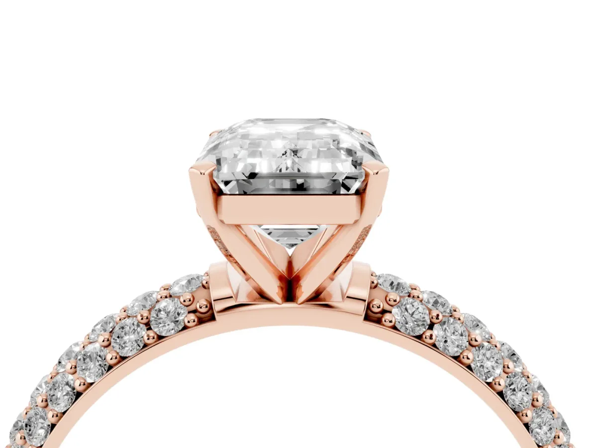 Emerald Cut Diamond Solitaire Ring with Prong Setting and Pavé Band Rose gold