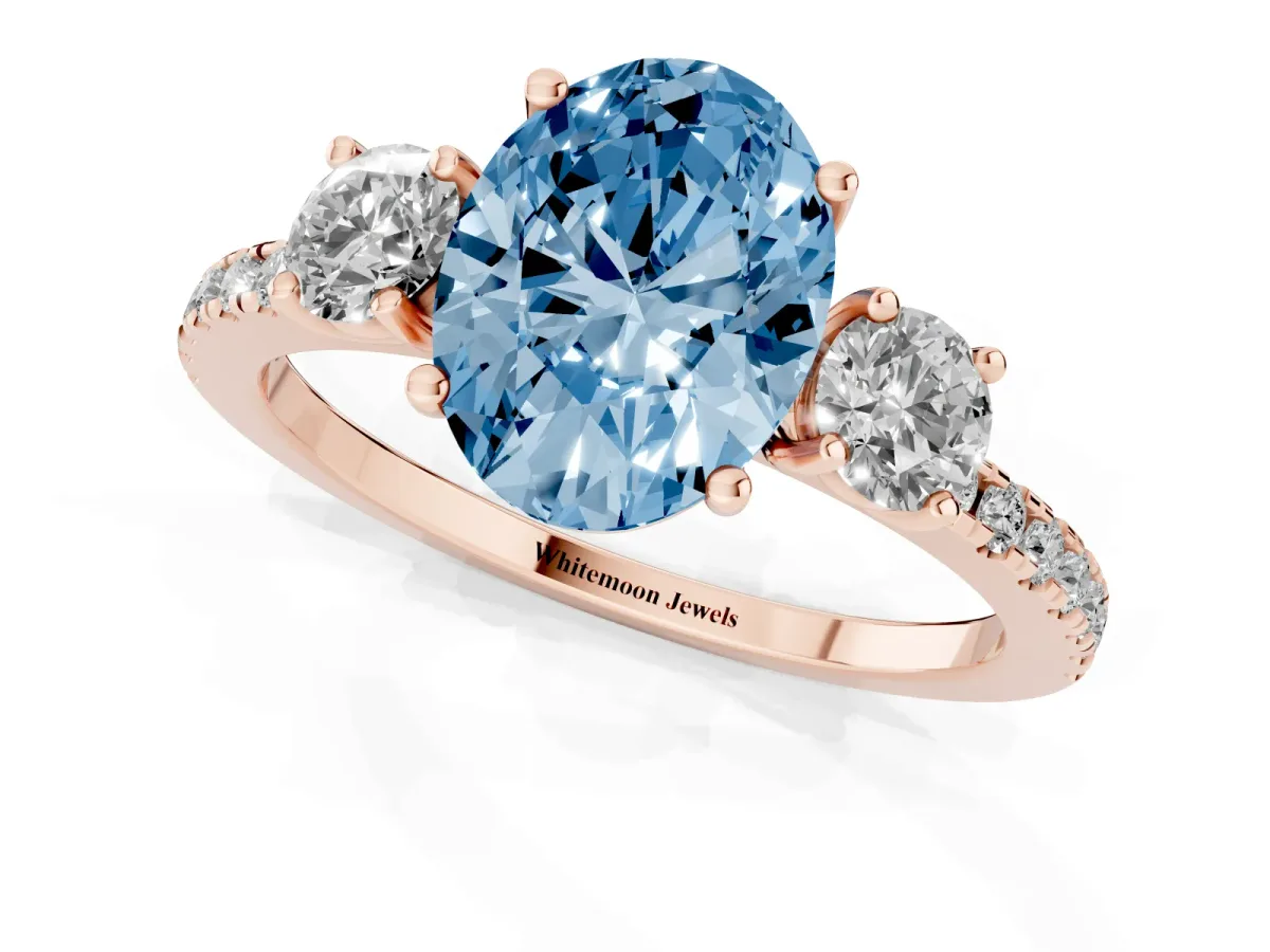 Fancy Blue Three-Stone Oval Cut Cut Diamond Pavé Band with Prong Setting Rose gold