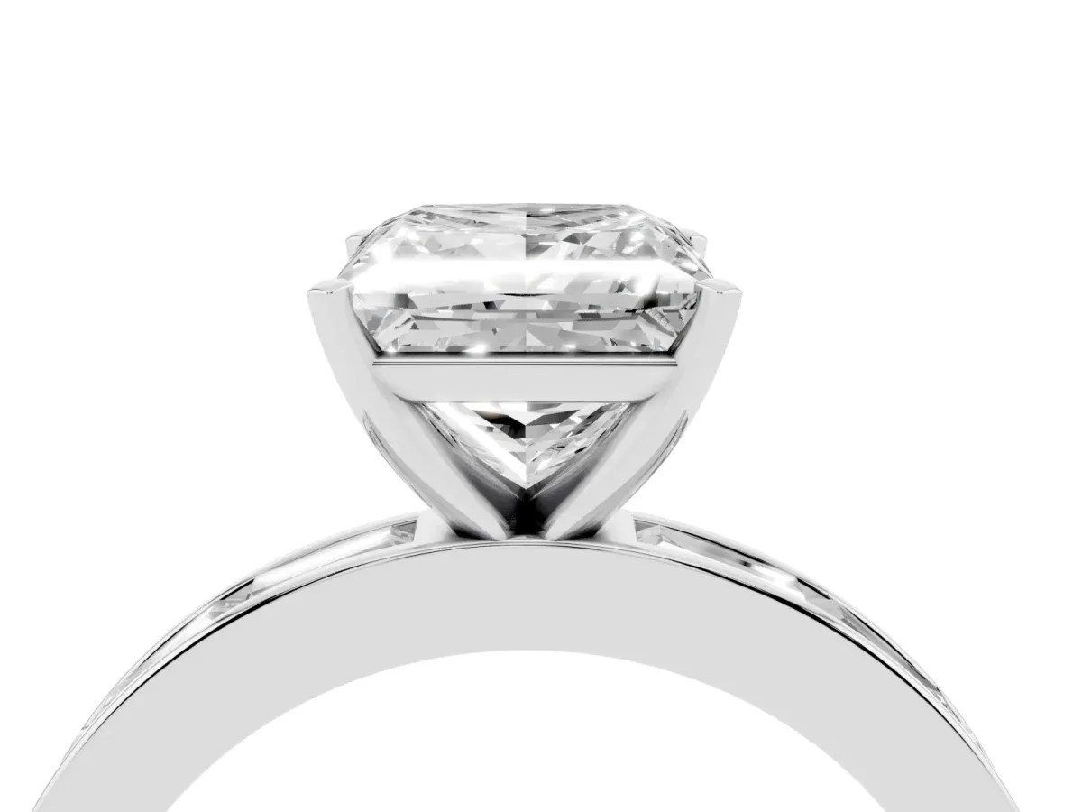 Princess Cut Solitaire Diamond Ring with Channel-Set Baguette Band and Four-Prong Setting Platinum