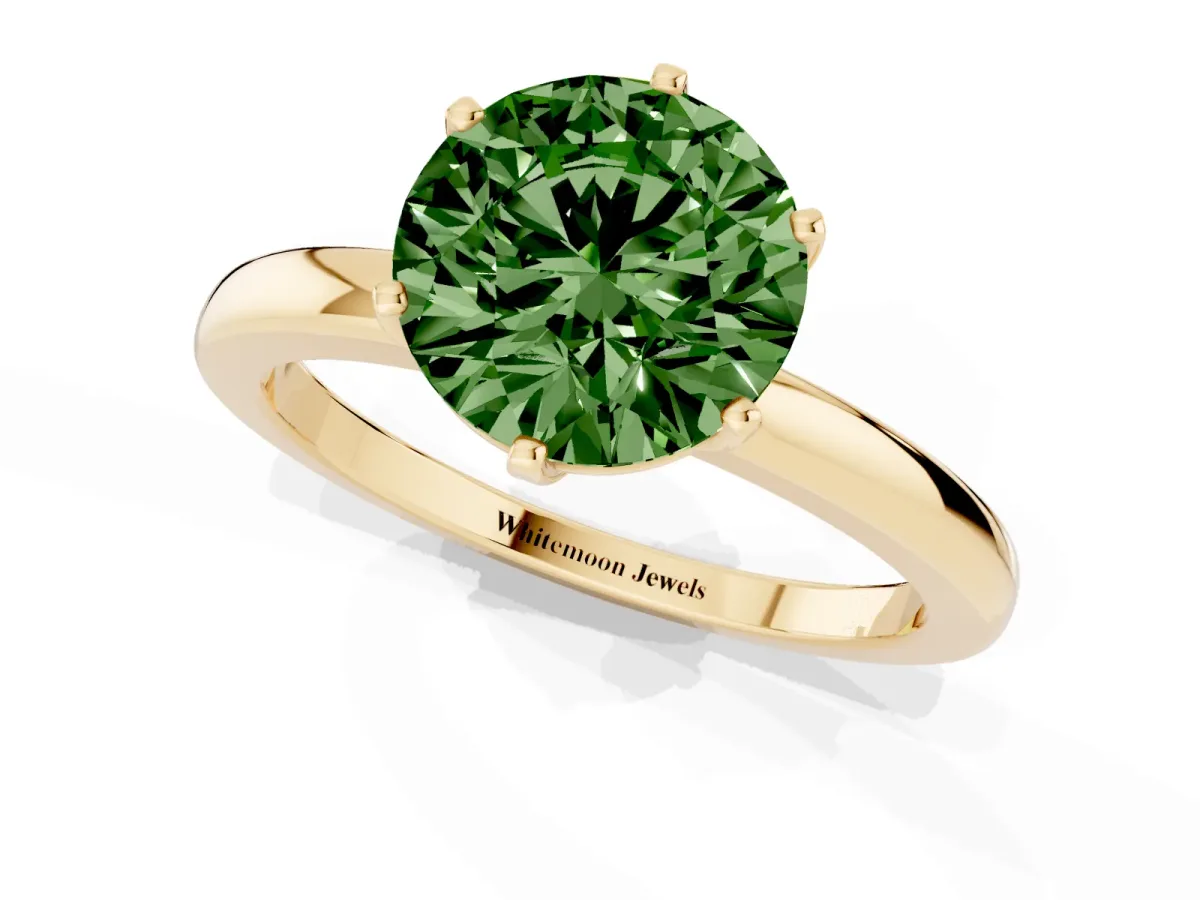 Fancy Green Round Cut Solitaire Diamond Ring with Six-Prong Setting on a Classic Band Yellow gold