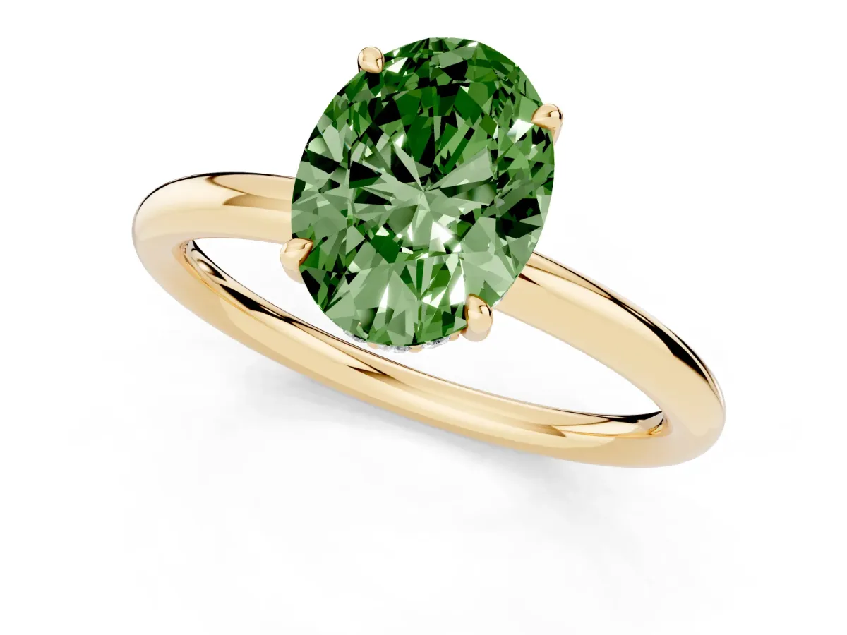Fancy Green Oval Cut Diamond Solitaire Ring with Thin Band and Four-Prong Setting Yellow gold