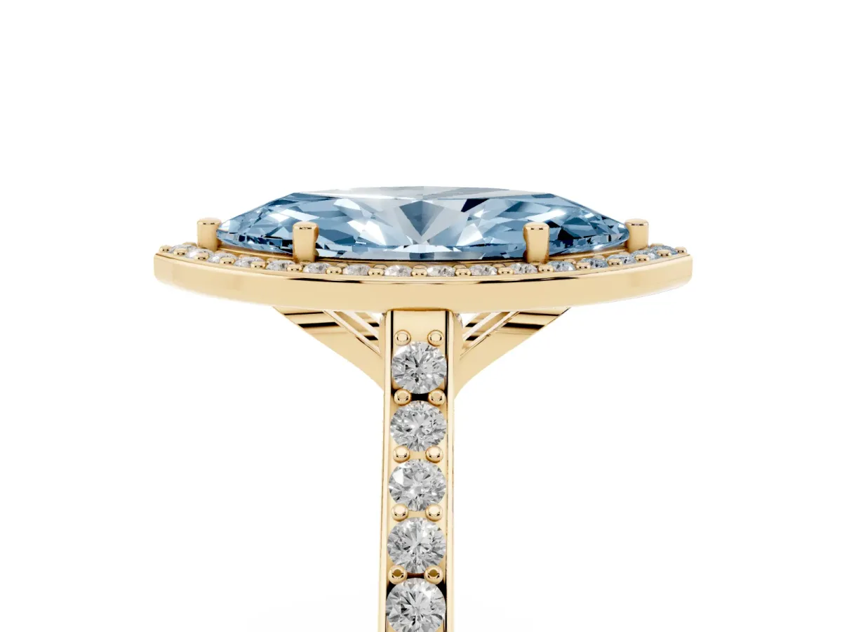 Fancy Blue Marquise Cut Diamond Halo Engagement Ring with Round Pavé Shoulders and Prong Setting Yellow gold