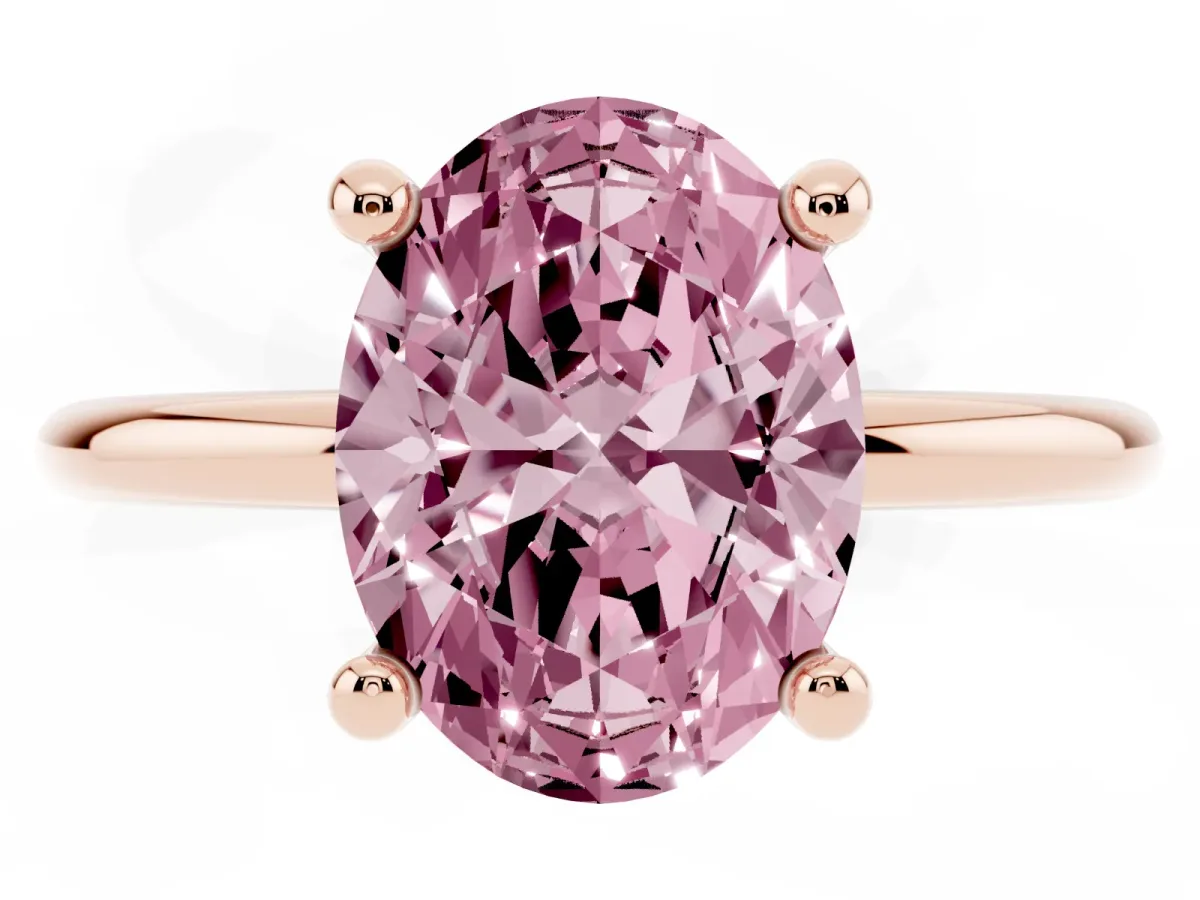Fancy Pink Oval Cut Solitaire Diamond Ring with 4-Prong Setting on a Classic Band Rose gold